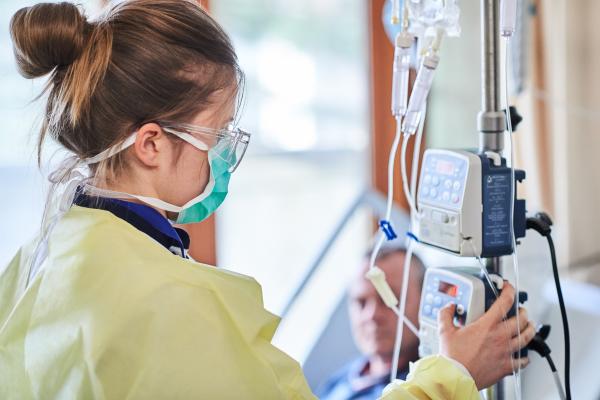 A nurse performing treatment procedures